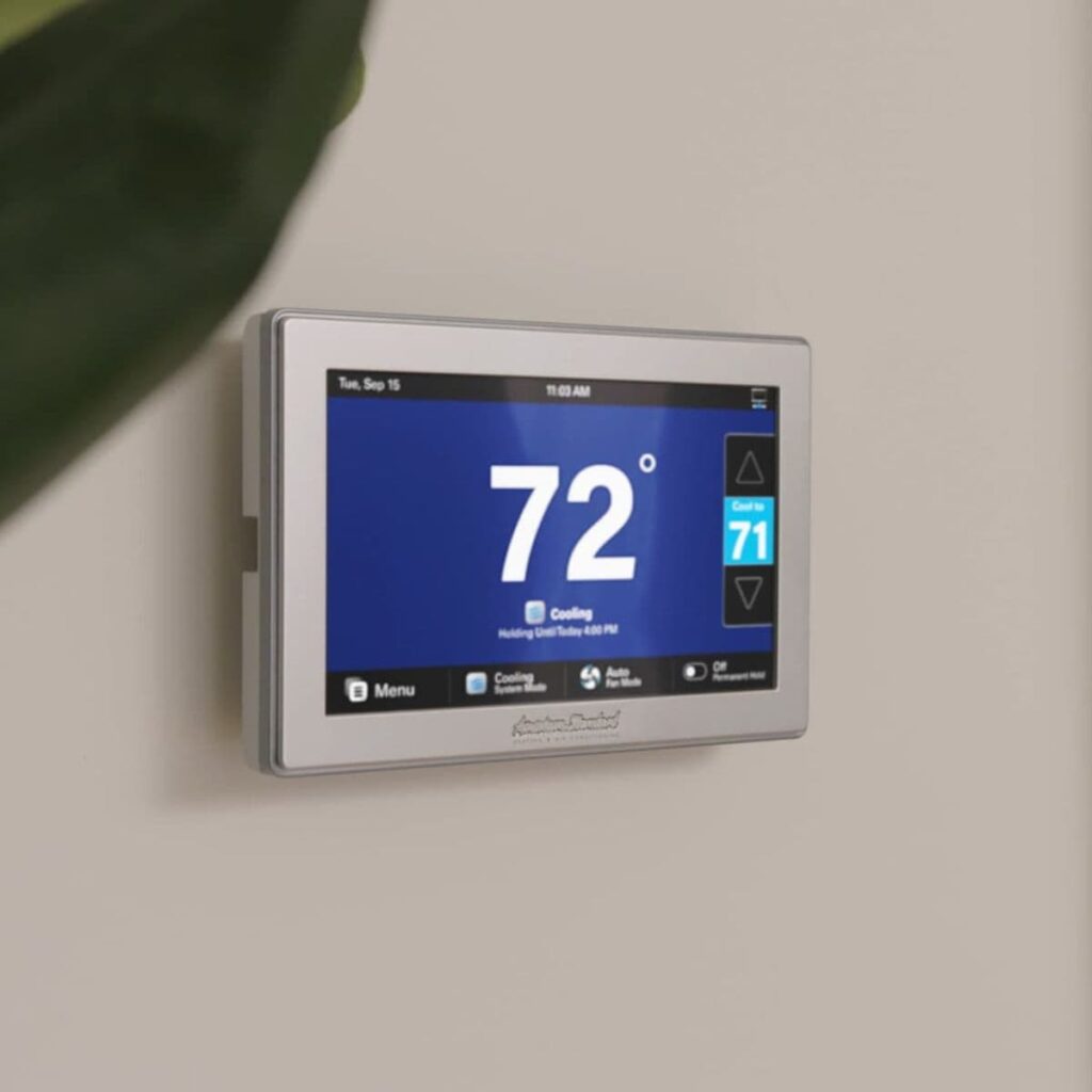 american standard smart thermostat installed on the wall in a home